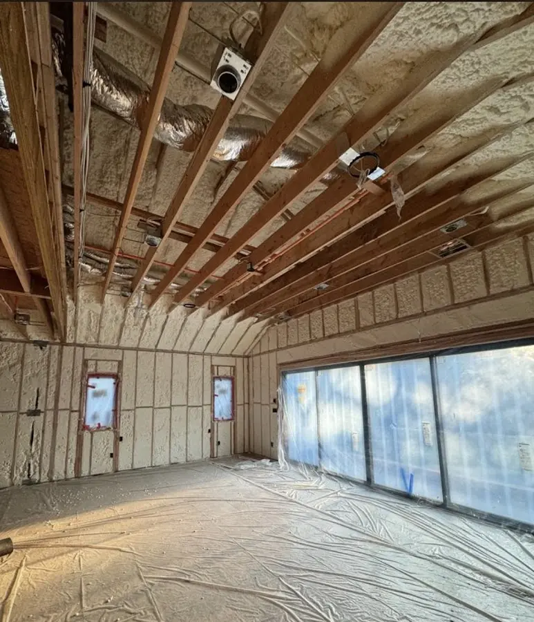 Interior walls and ceiling insulated with spray foam during new construction in South Hill